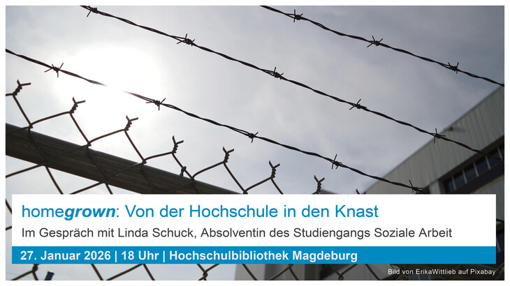 Stacheldrahtzaun von einem Gebäude